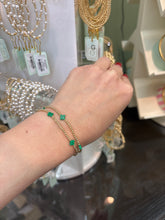 Load image into Gallery viewer, Signature Cross Small Gold Pattern 2mm Bead Bracelet- Emerald