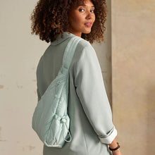 Load image into Gallery viewer, Featherweight Sling Backpack in Calm Mint