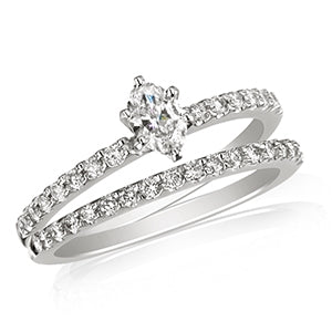 14kt 5/8ct tw-1/2ct Oval Diamond Center Engagement Ring